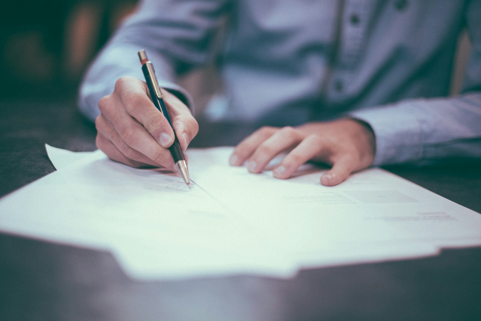 Professional desk with documents and paperwork for an immigration medical exam appointment
